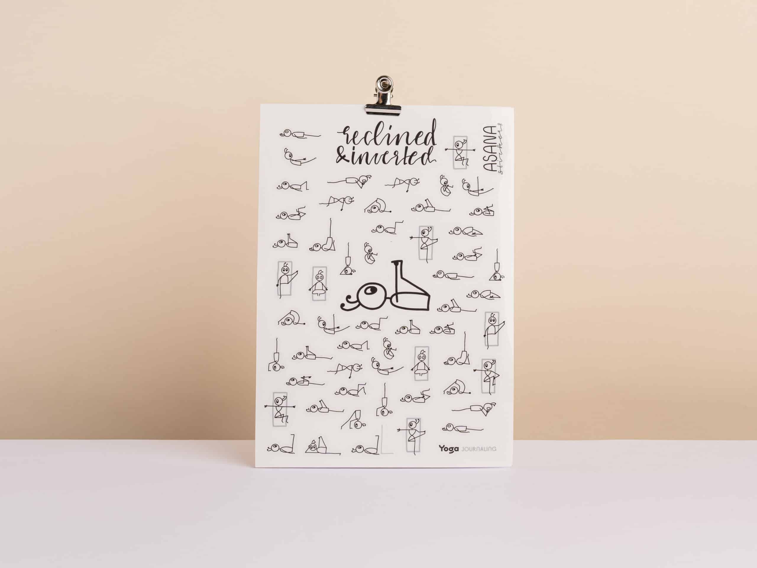 Asana stickers arranged to show a calming seated yoga sequence with stick figures in a practice notebook