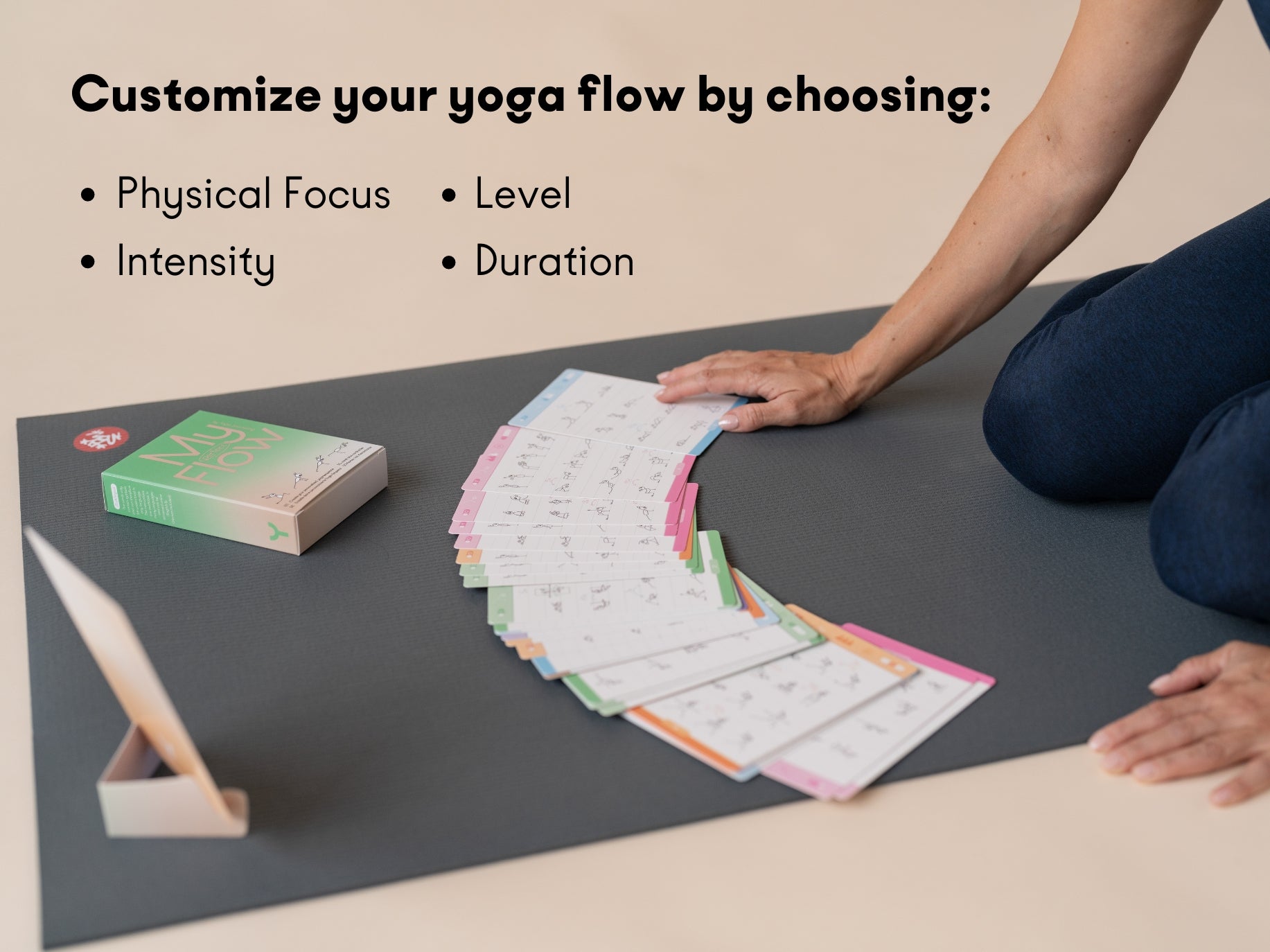 Couple enjoying a yoga session with the My Perfect Flow yoga card deck – a fun and thoughtful gift for yoga-loving partners